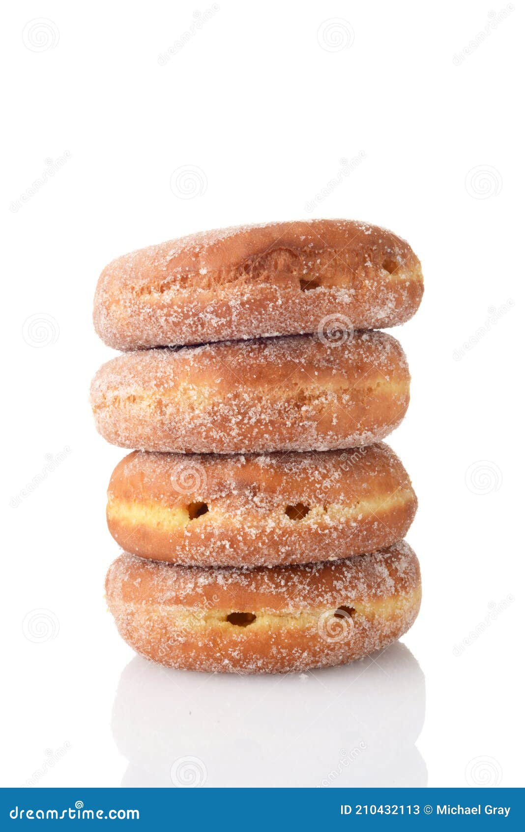 stack of sugar paczki donuts