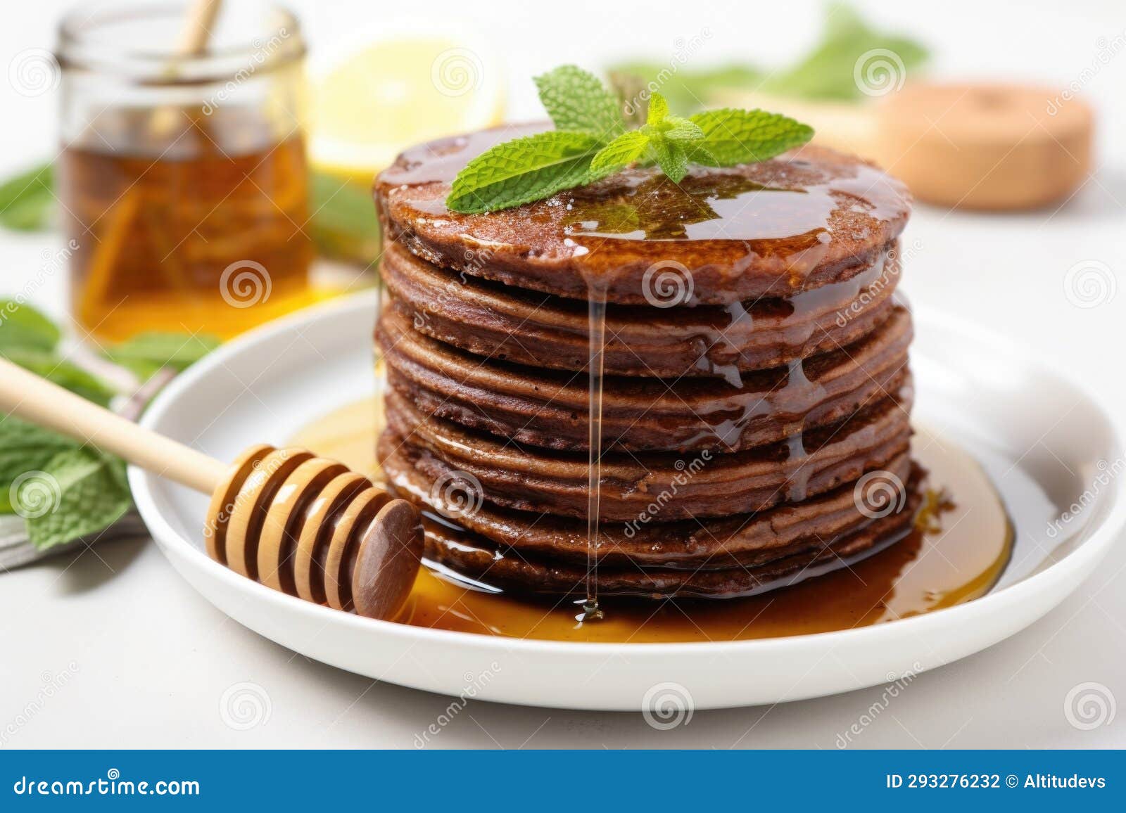 A Stack of Vegan Buckwheat Pancakes with Agave Syrup Stock Photo