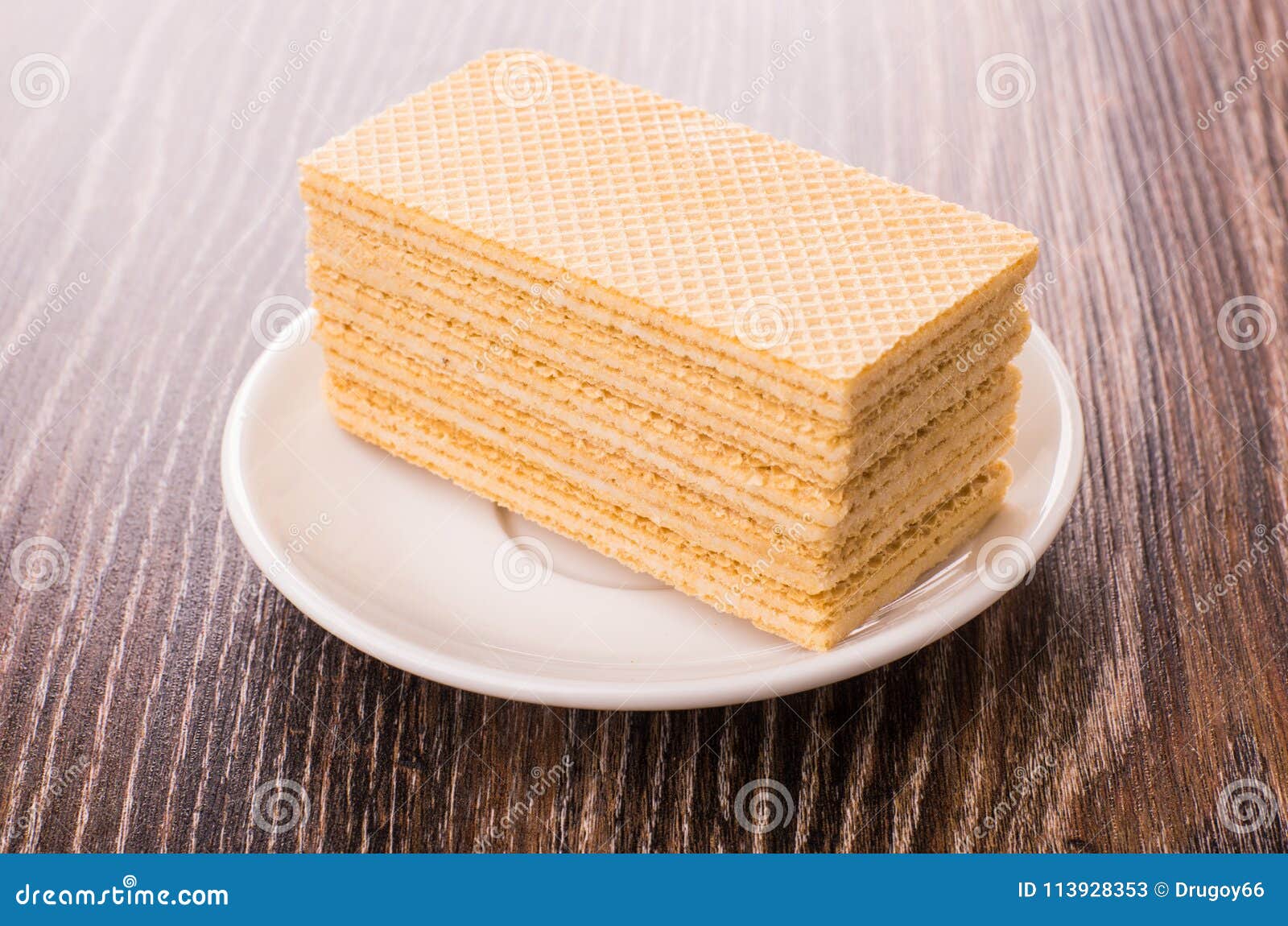 Stack of Wafers in White Saucer on Table Stock Image Image of dark
