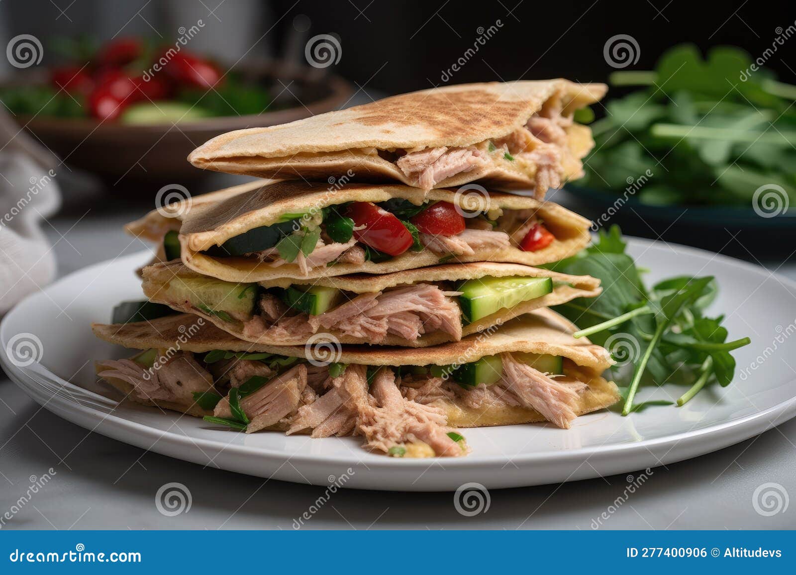 Stack of Warm Tortillas with Creamy Tuna Salad and Crisp Veggies Stock