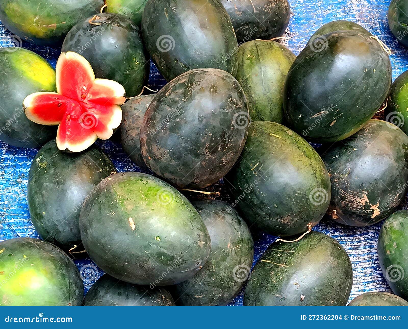 Stack of Watermelon with a Flower Shaped Cut Piece Stock Photo Image