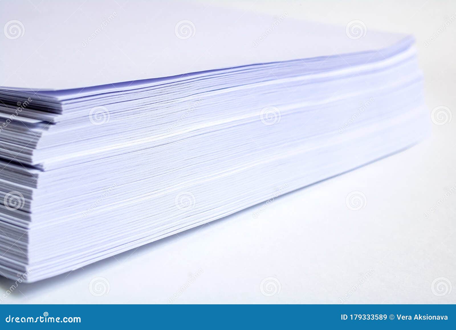 Stack of White Paper for Printer on Gray Background Stock Image