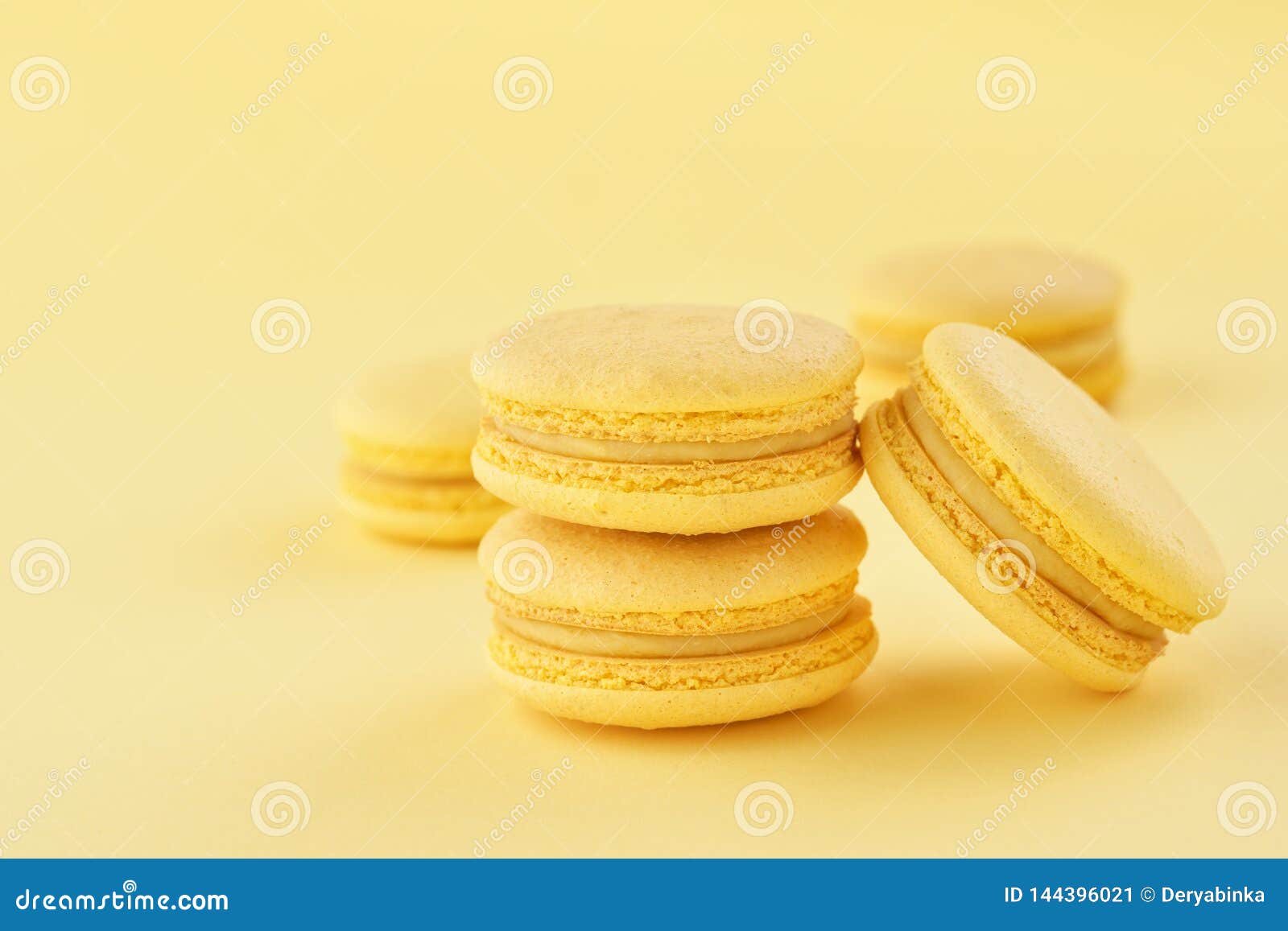 Stack of Yellow Macarons on Same Color Background Stock Image - Image ...