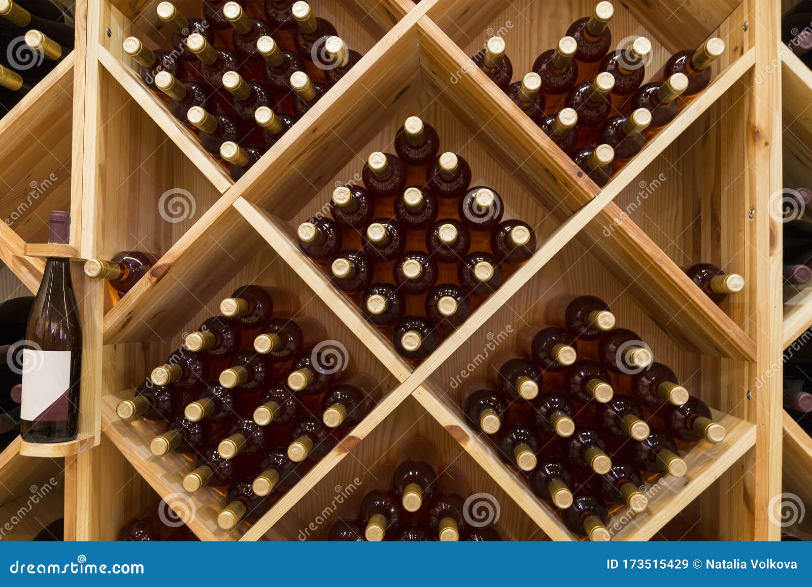 Stacked Bottles of Grape Wine in a Wine Cellar Stock Image Image of
