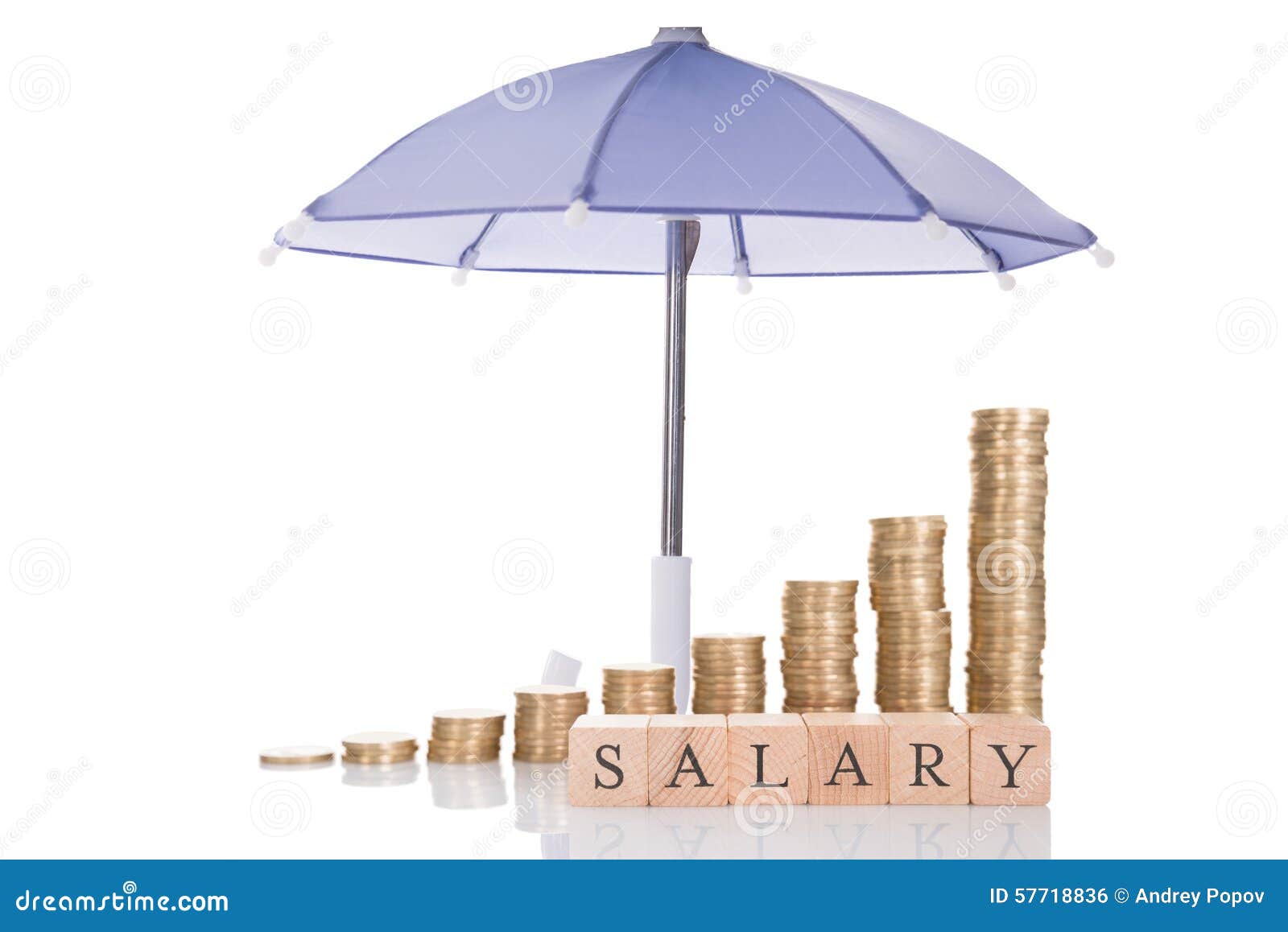 Stacked Coins and Salary Blocks Under Umbrella Stock Photo Image of