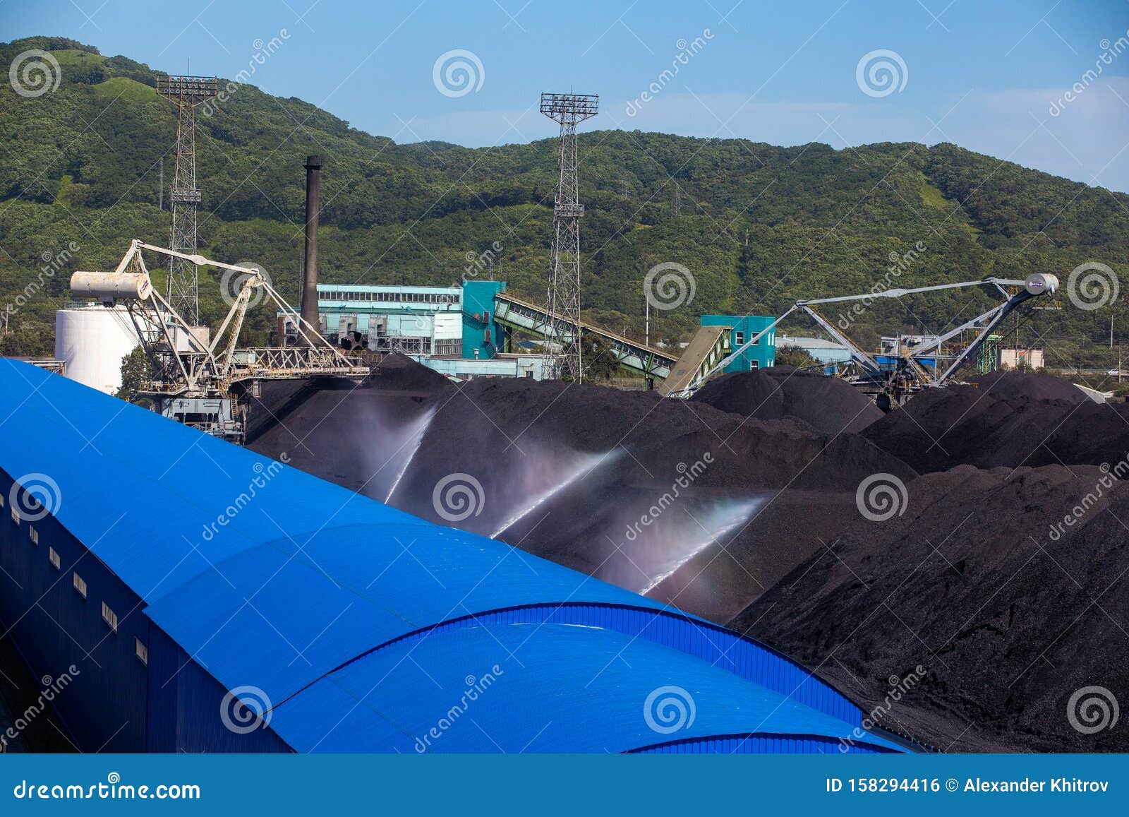 Unloading Coal From Barge To Hopper RoyaltyFree Stock Photography