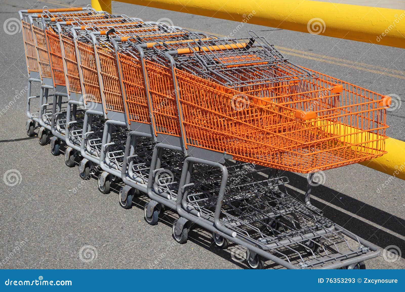 Stacking Shopping Carts in Parking Lot Outside Store Stock Image
