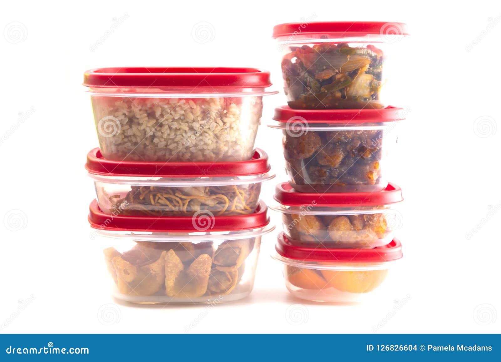 boxes with red lids filled with leftover food