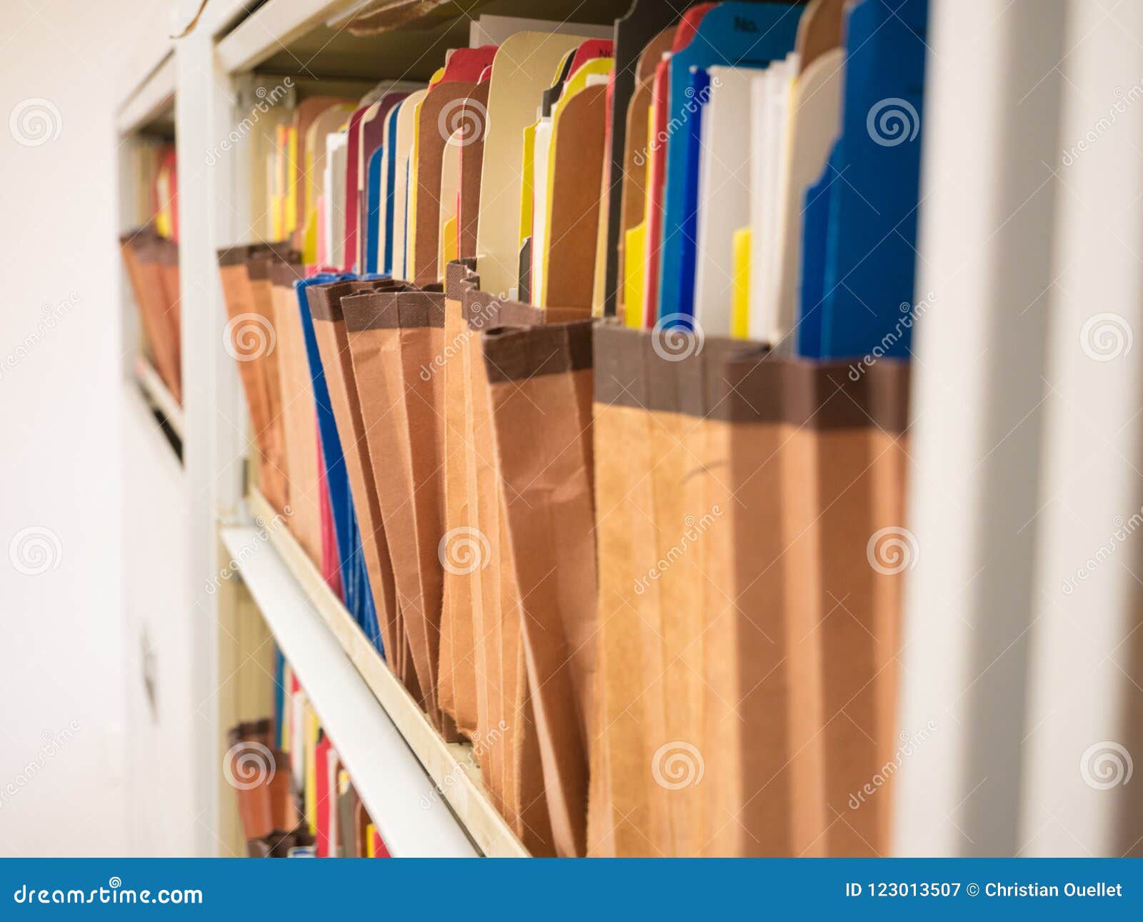 Stacks Of Document Paper And Files Folder In A Filing Cabinet