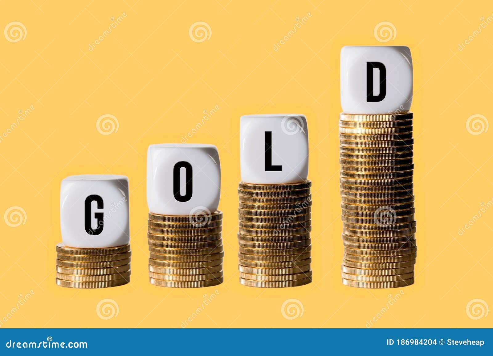 Stacks Of Gold Coins With Cubes Spelling GOLD To Show Rise ...