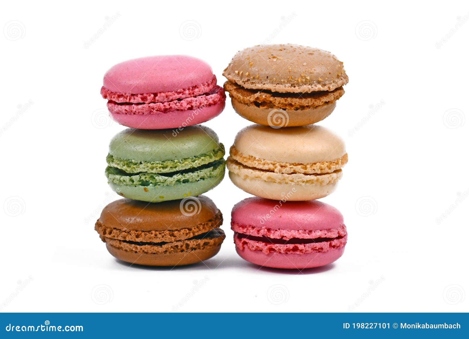 Stacks of Green, Brown, Pink and Yellow French Macarons on White ...