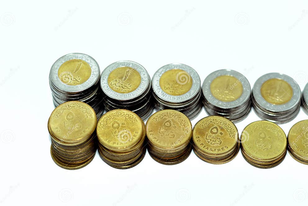 Stacks Of 1 LE EGP One Egyptian Pound Coins Cash And 50 Fifty Egyptian stacks-of-1-le-egp-one-egyptian-pound-coins-cash-and-50-fifty-egyptian