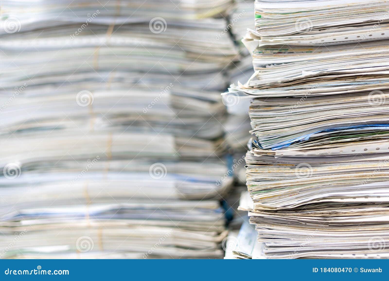 stacks of paper files work desk office, business report papers,piles of unfinished documents achieves