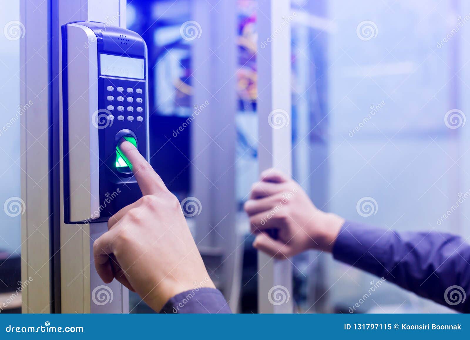 staff push down electronic control machine with finger scan to access the door of control room or data center. the concept of data