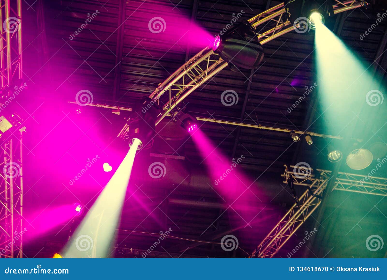 Stage Lights on Concert. Lighting Equipment with Multicolored Beams
