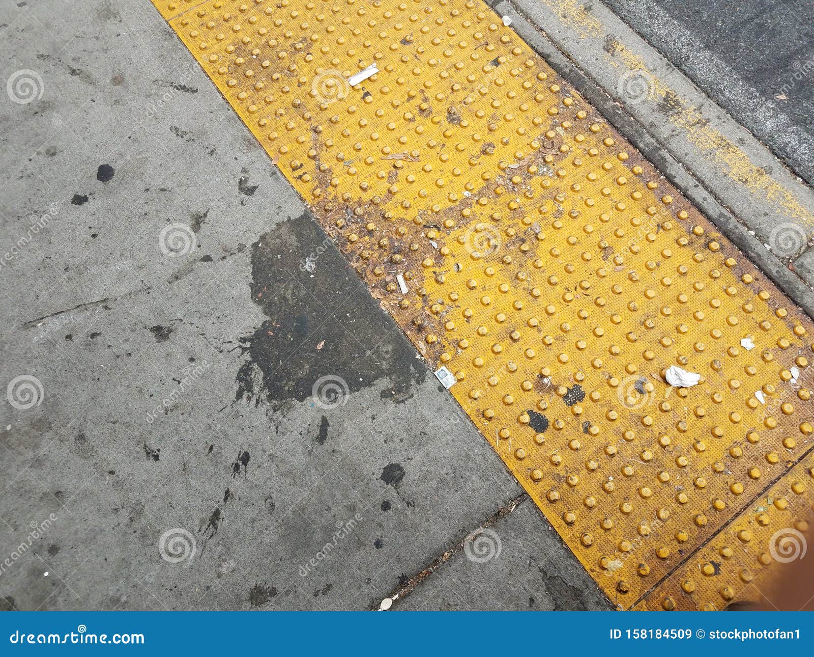 Stain or Spill on Grey Cement with Yellow Bumps Stock Image Image of