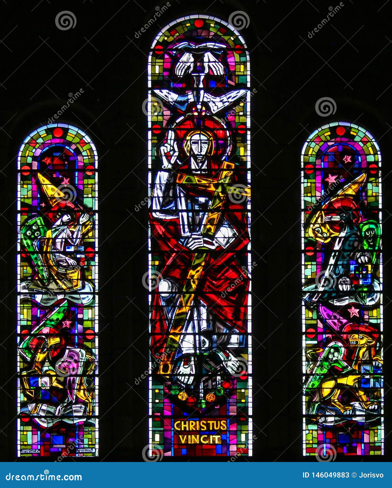 stained glass of christ and the four evangelists
