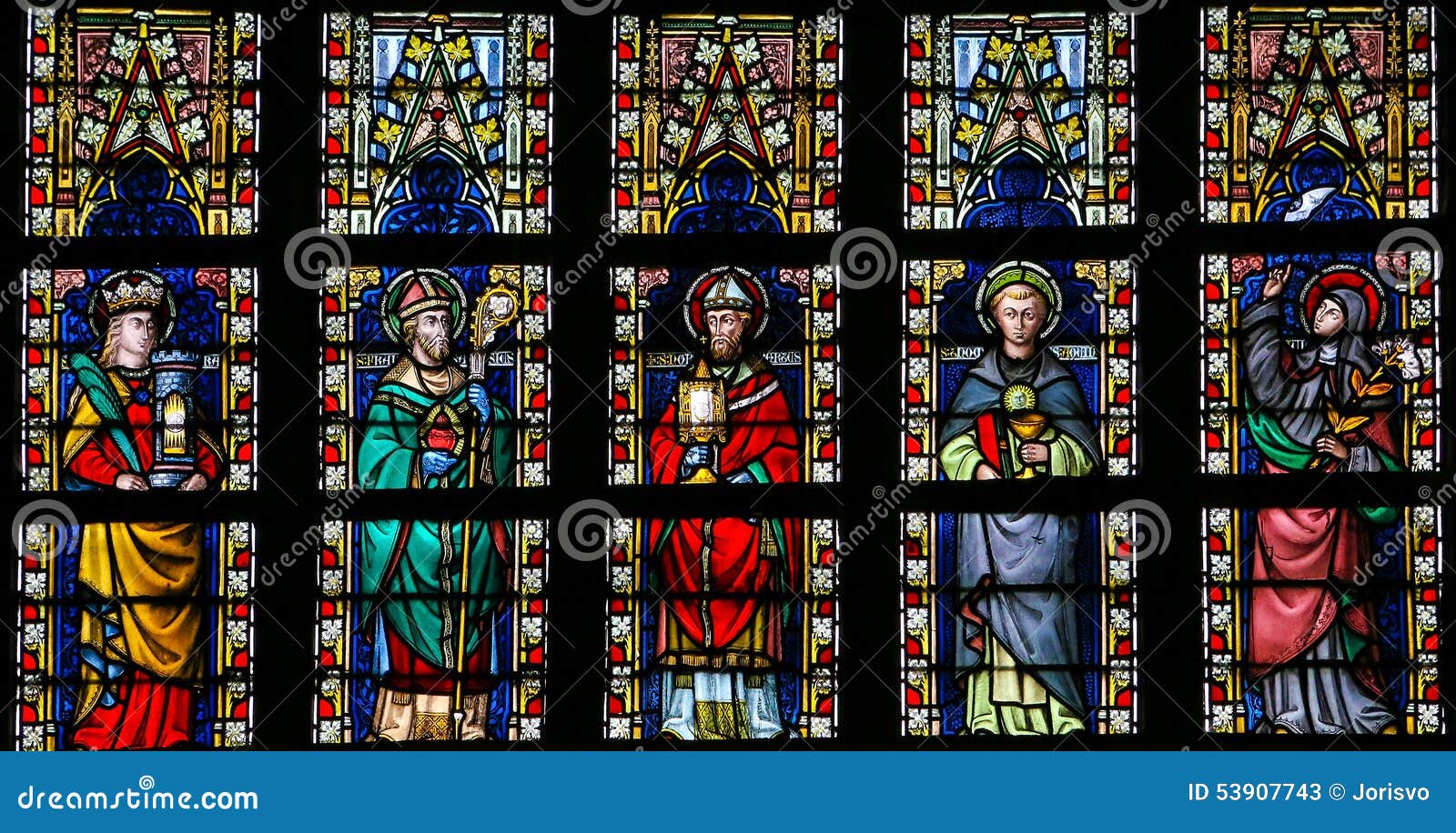 stained glass window depicting catholic saints