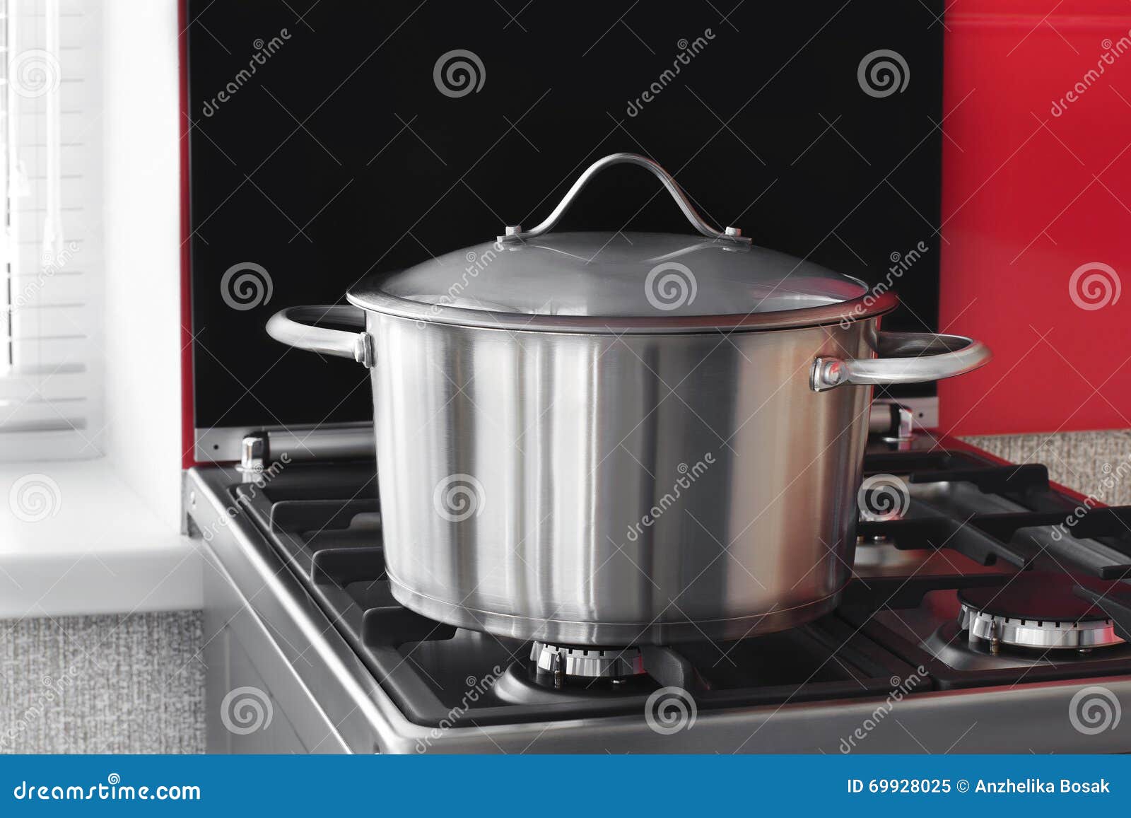Stainless Saucepan on a Gas Stove Stock Image Image of steel, black