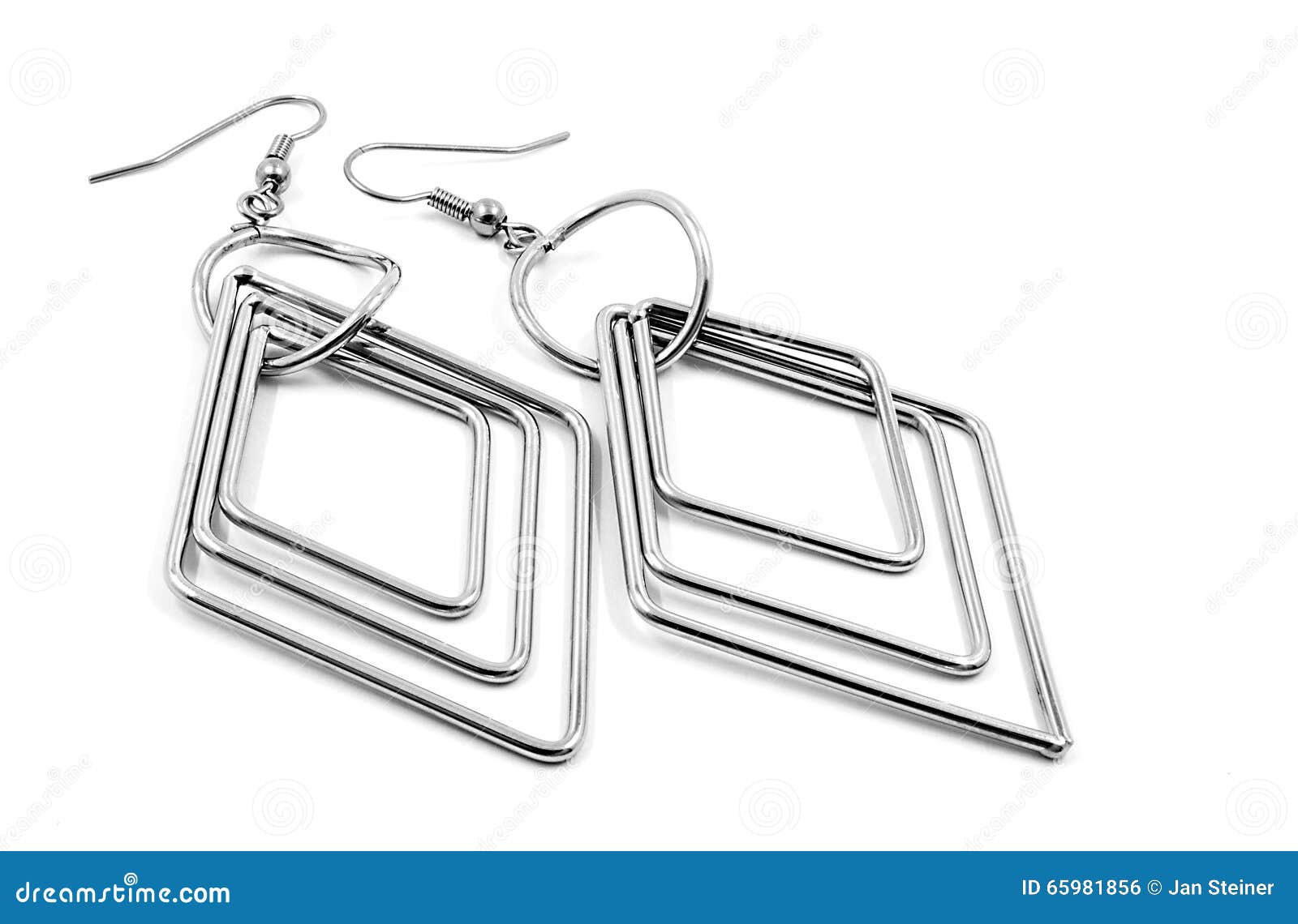 Stainless steel earrings stock photo. Image of steel 65981856