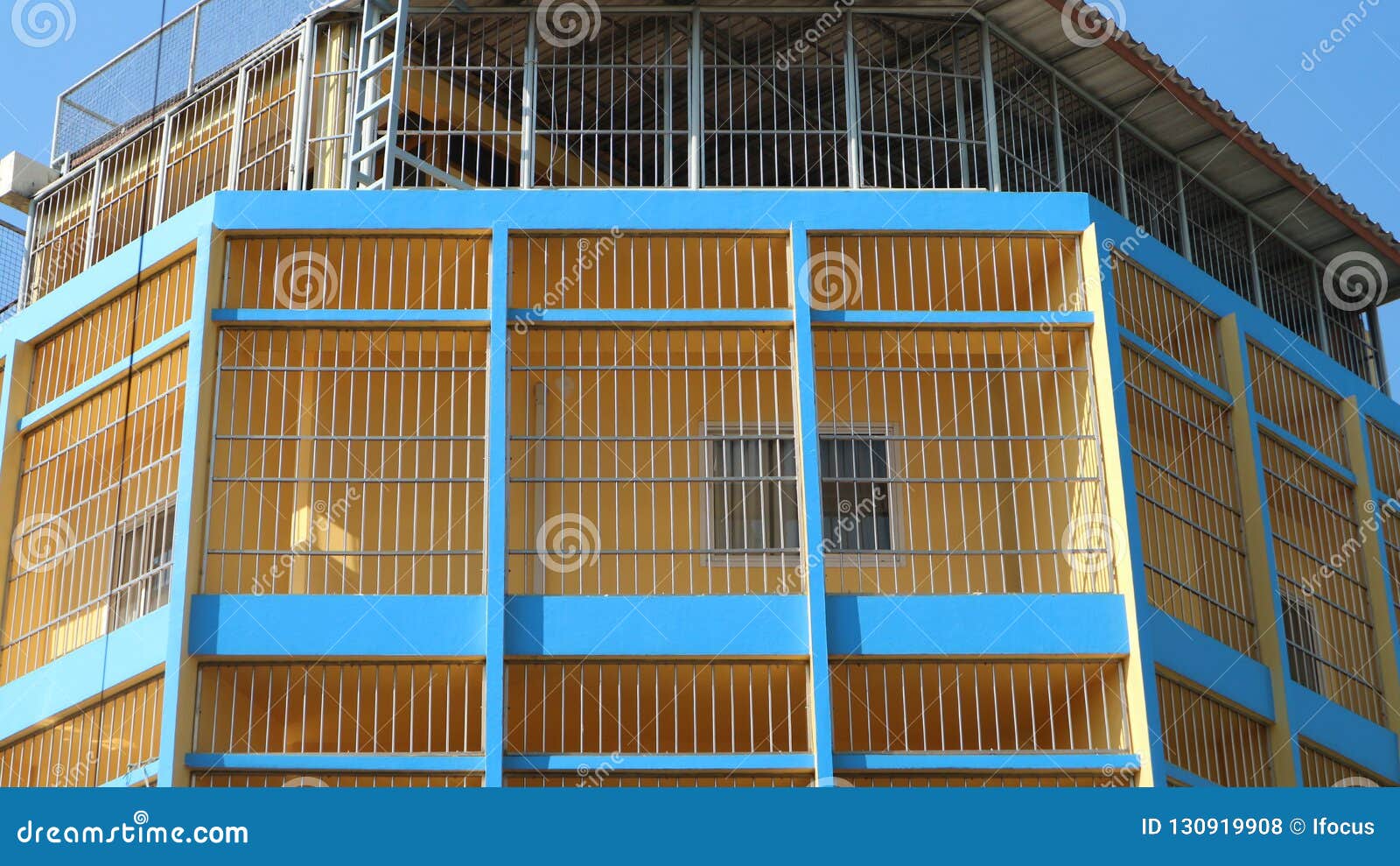 Stainless Steel Protection Grates On Small Building Stock Photo
