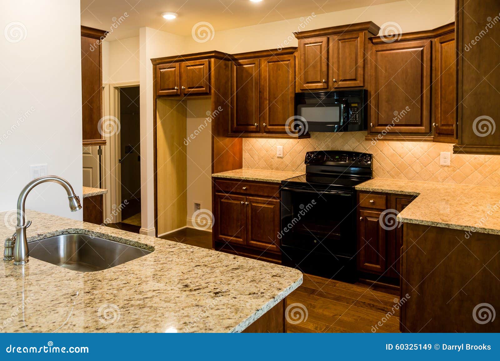 Stainless Steel Sink And Black Appliances Stock Image Image Of