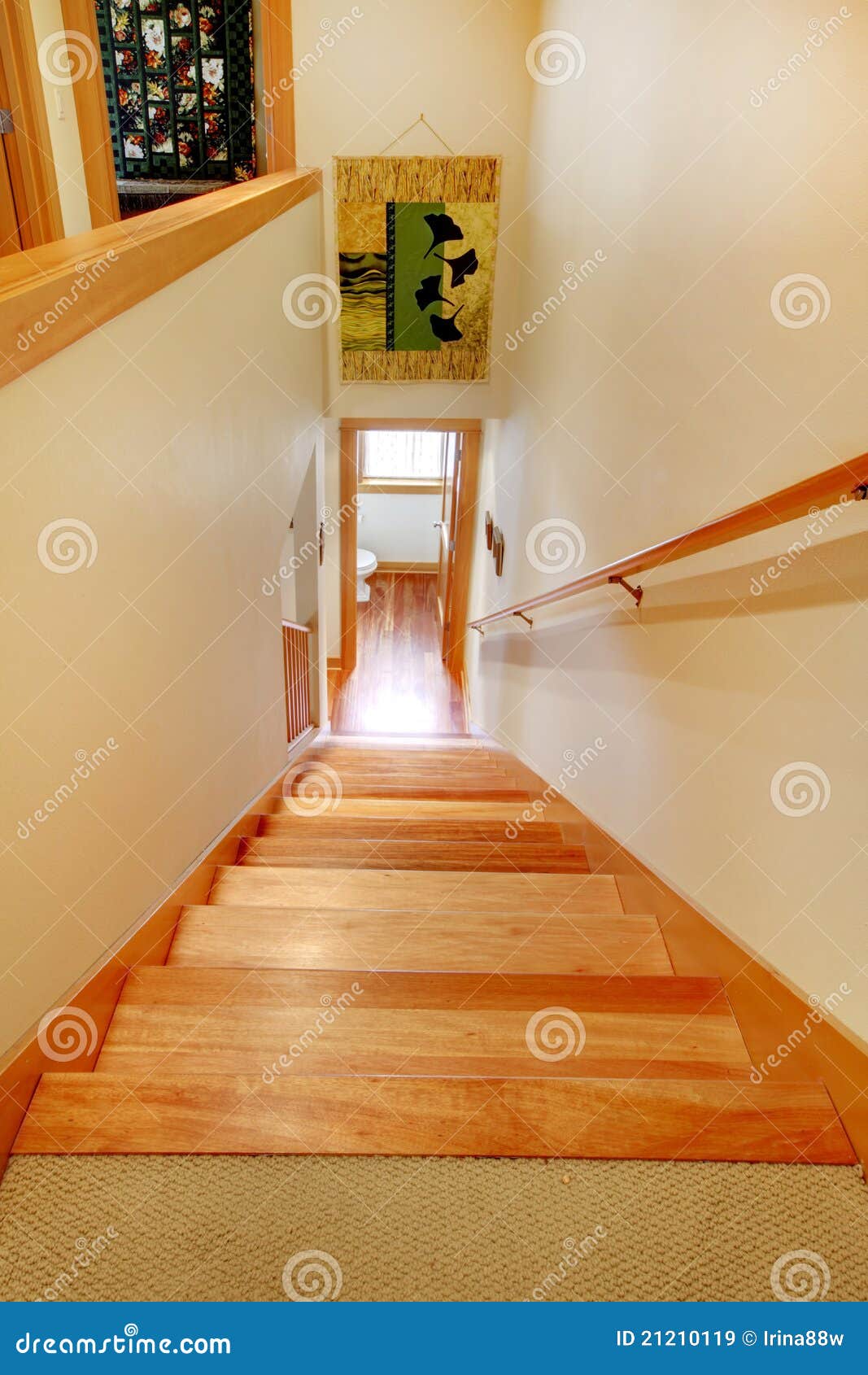 staircase and ipen door to the bathroom