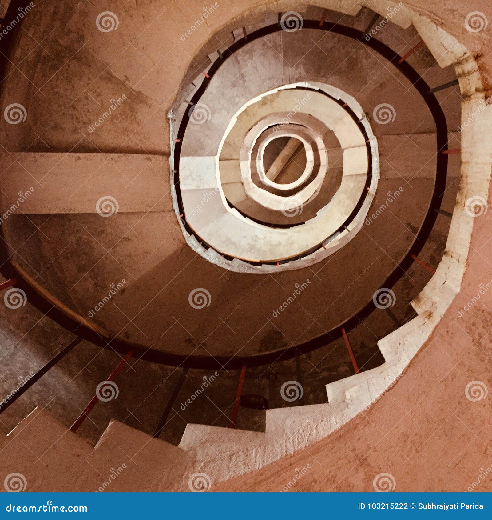 a staircase spiralling upward in a lighthouse