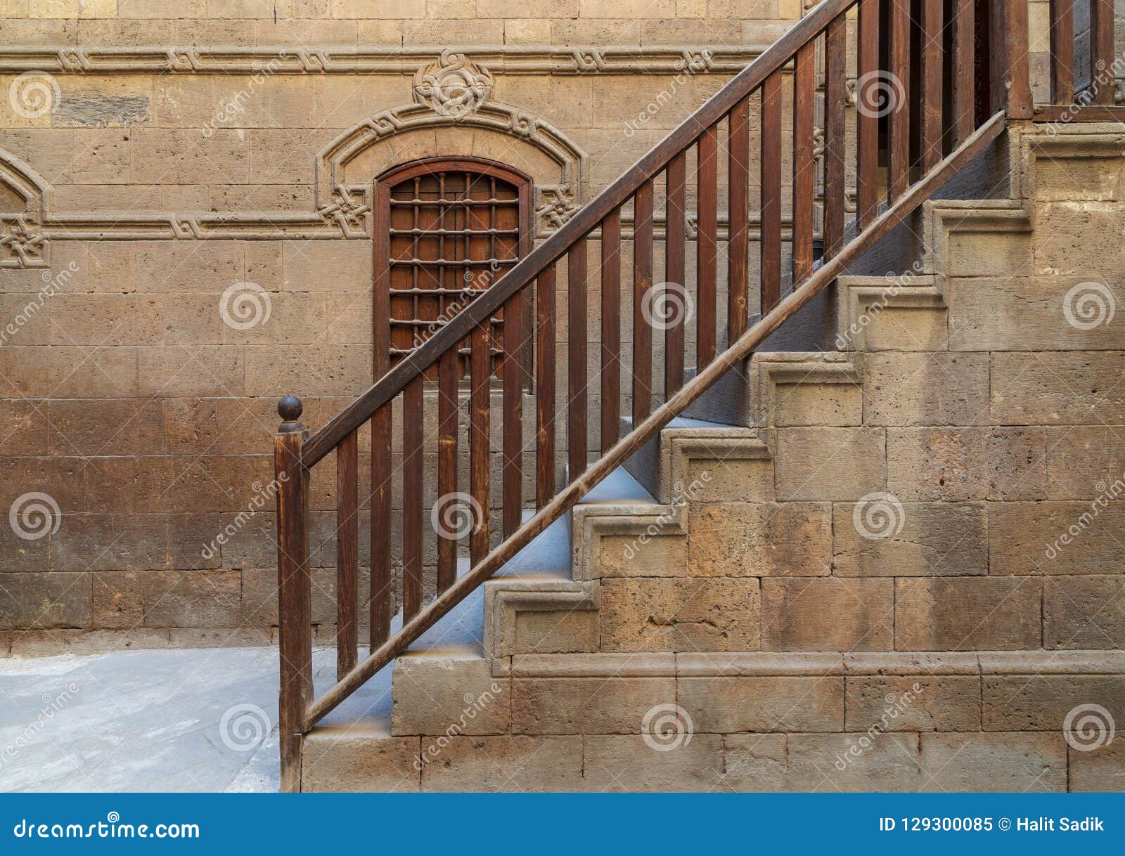 staircase with wooden balustrade leading to zeinab khatoun historic house, old cairo, egypt