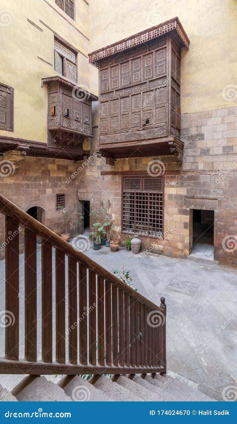 wooden balustrade revealing patio of ottoman historic house of el sehemy with wooden oriel windows