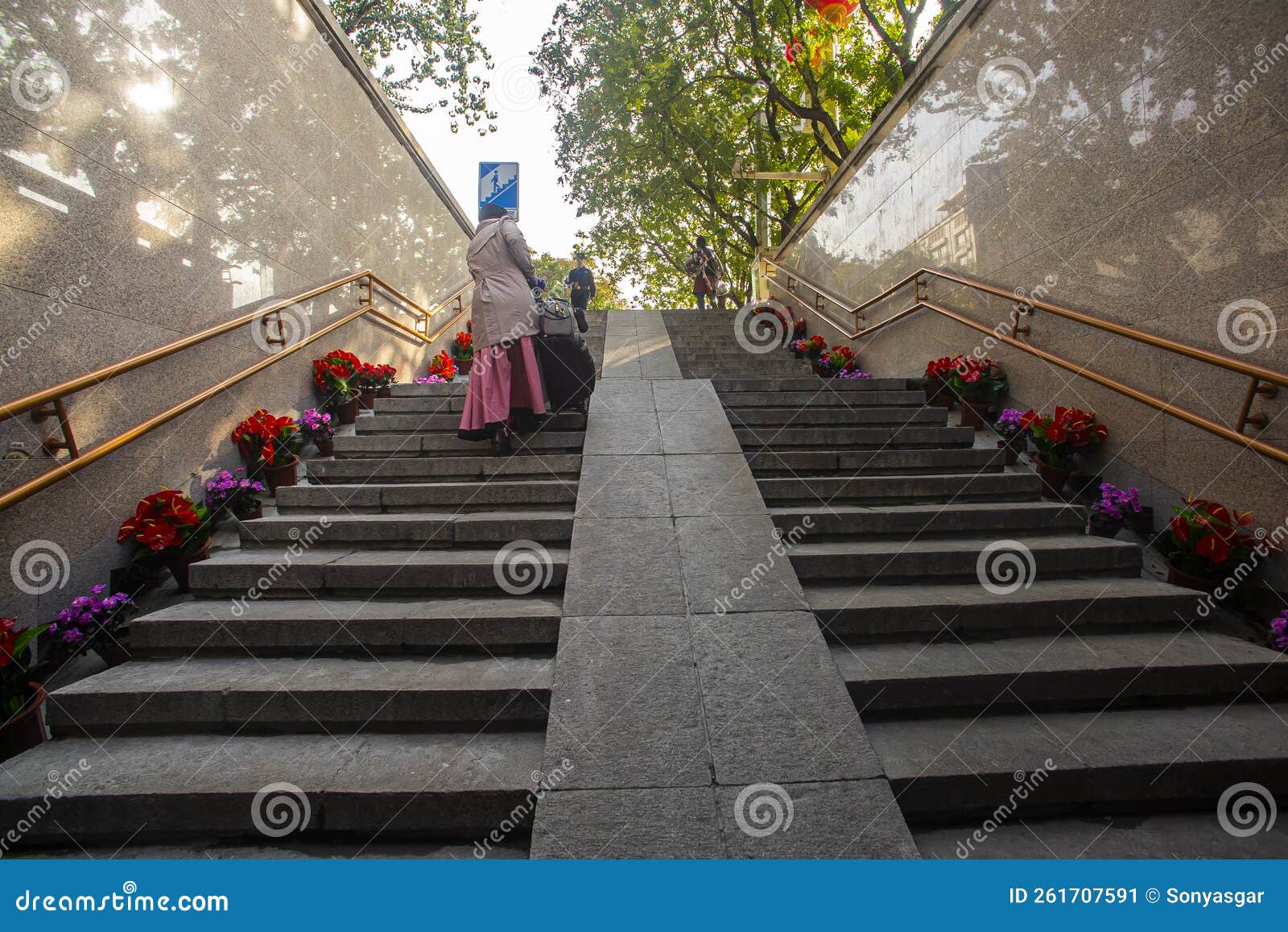 The Stairs Down Lead To The Tunnel Where People Cross The Street In ...