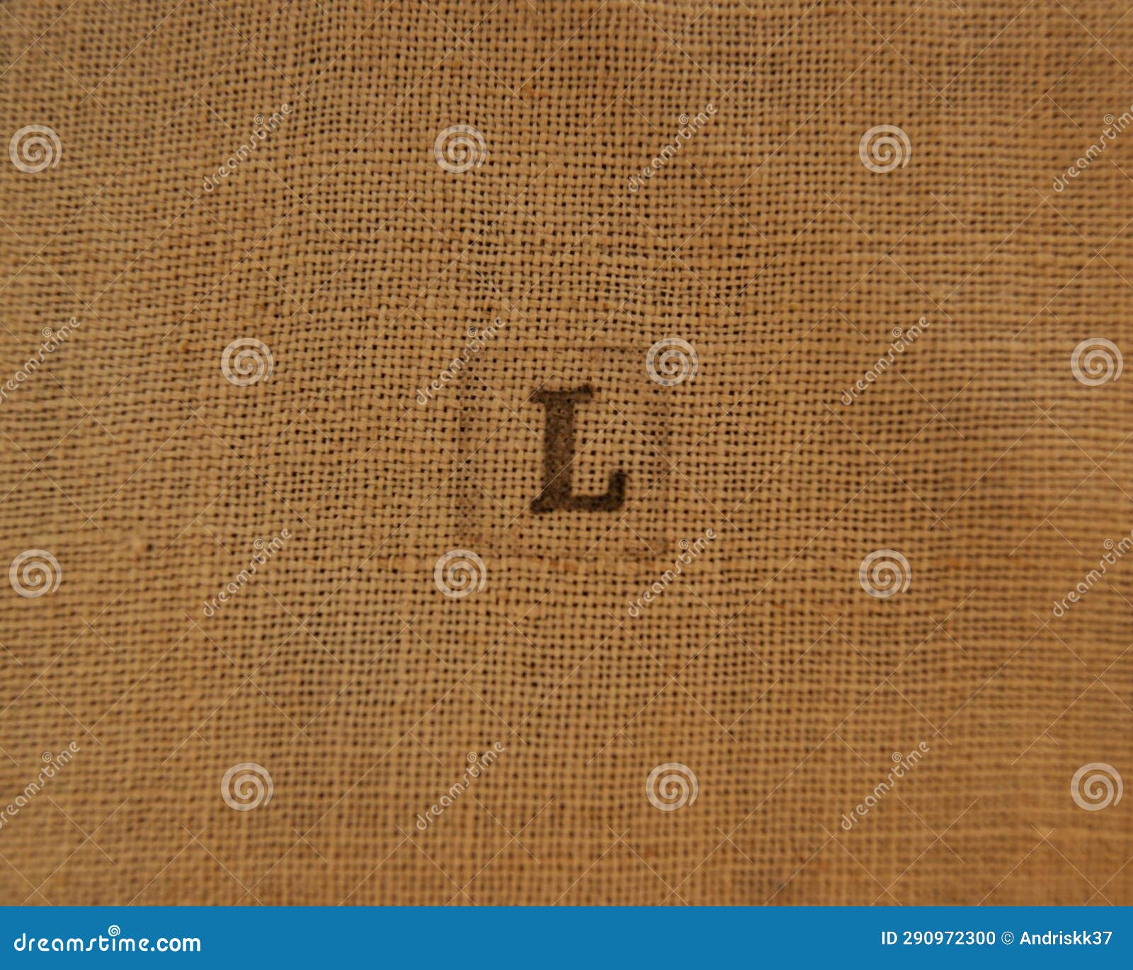 Stamp Letters on Linen Fabric. Letter L. Stock Photo Image of sign