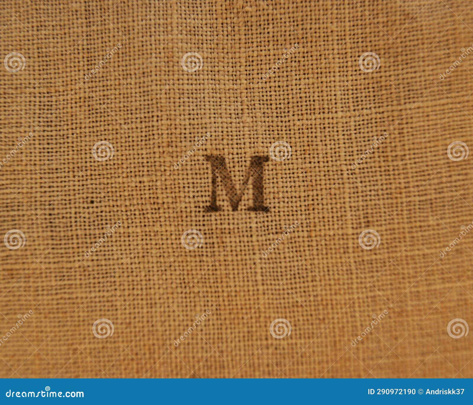 Stamp Letters on Linen Fabric. Letter M. Stock Photo Image of symbol