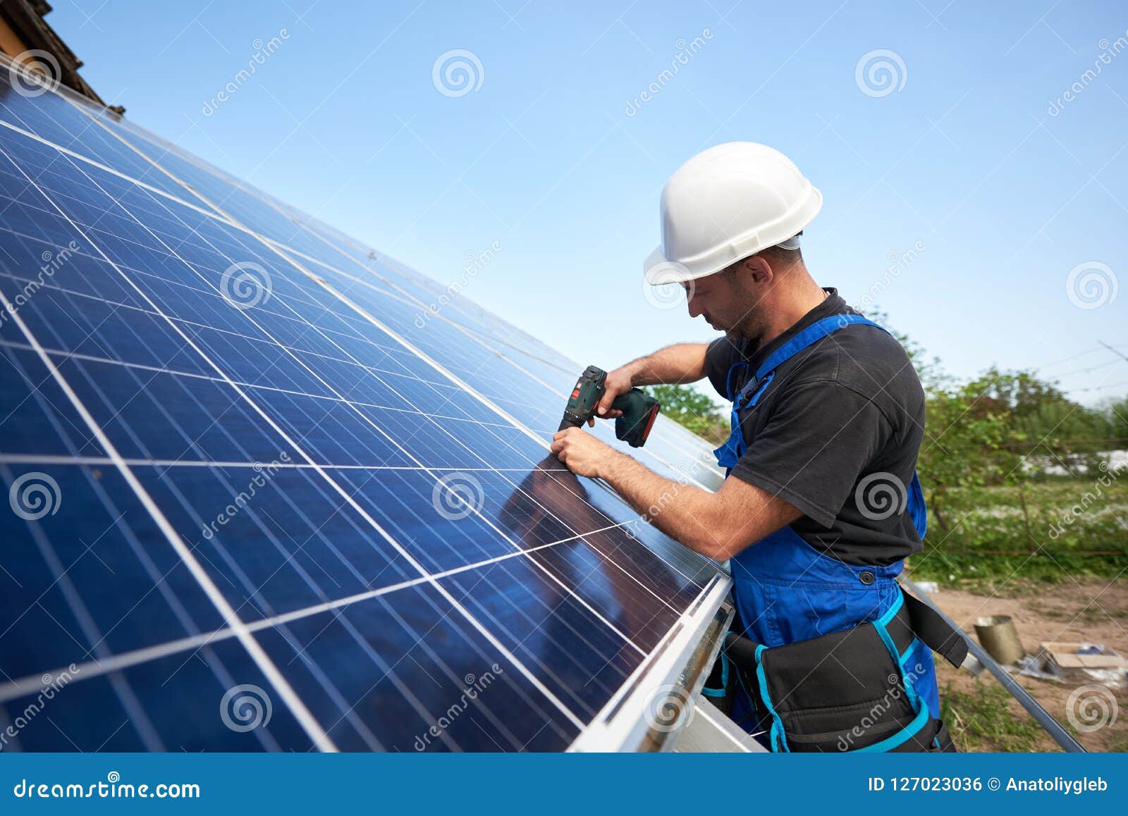 stand-alone exterior solar panel system installation, renewable green energy generation concept.