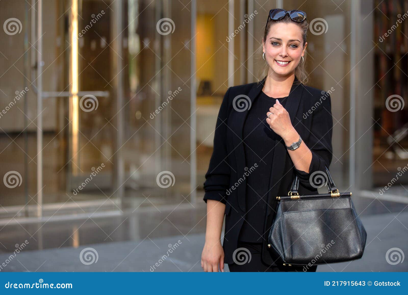 Standing Portrait of a Successful and Affluent Modern Businesswoman ...