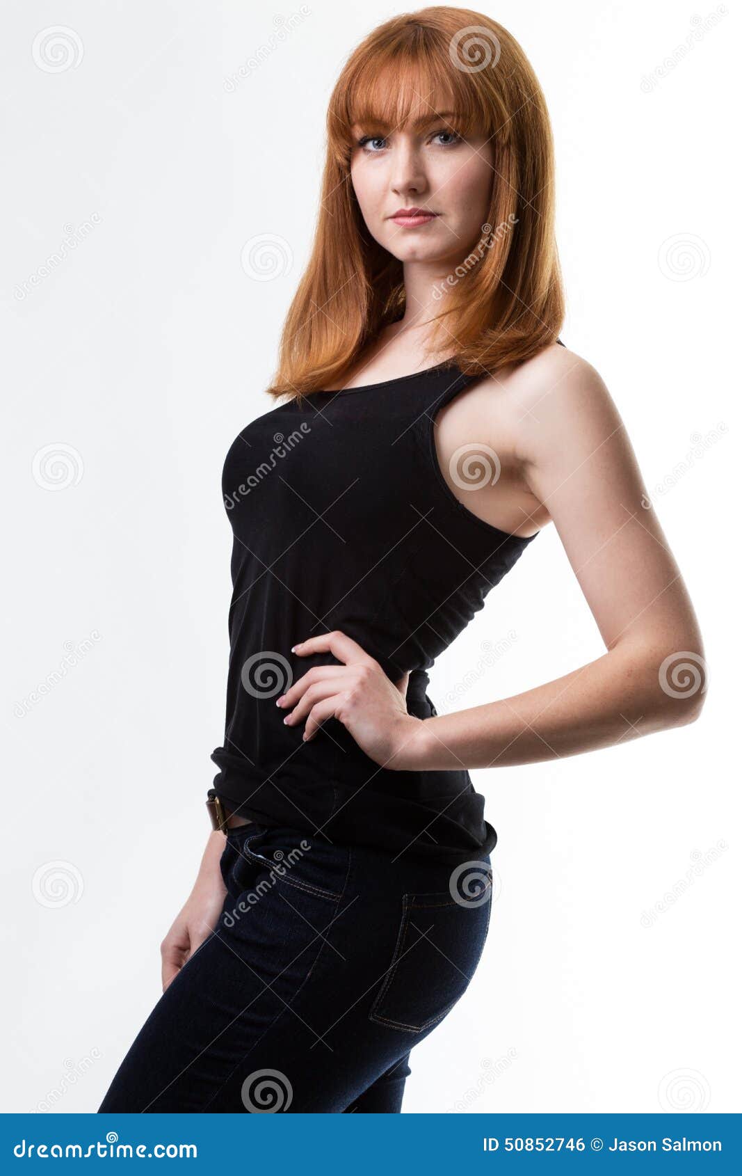 Standing portrait. Portrait of woman standing in the studio