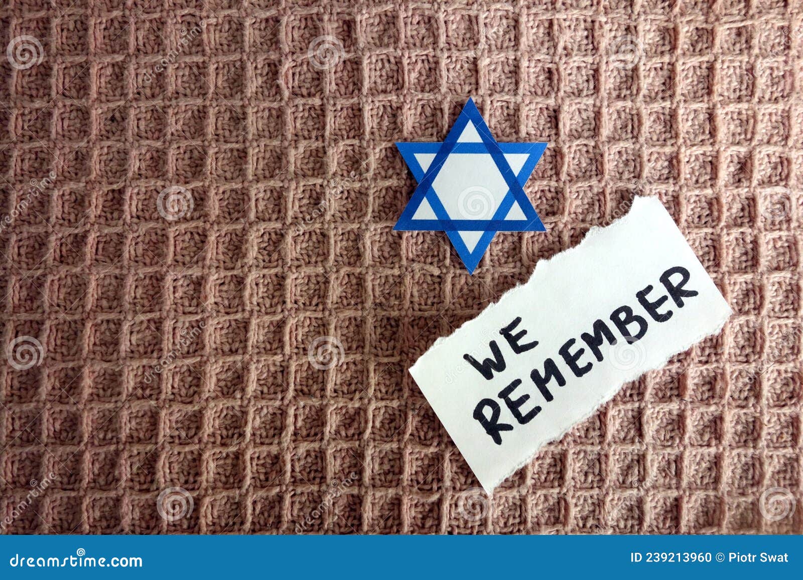 star of david with text we remember, holocaust memory day