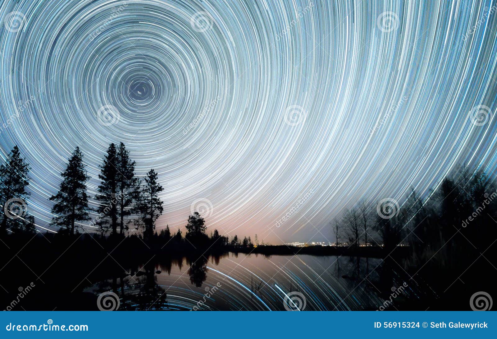 star trails over the pond