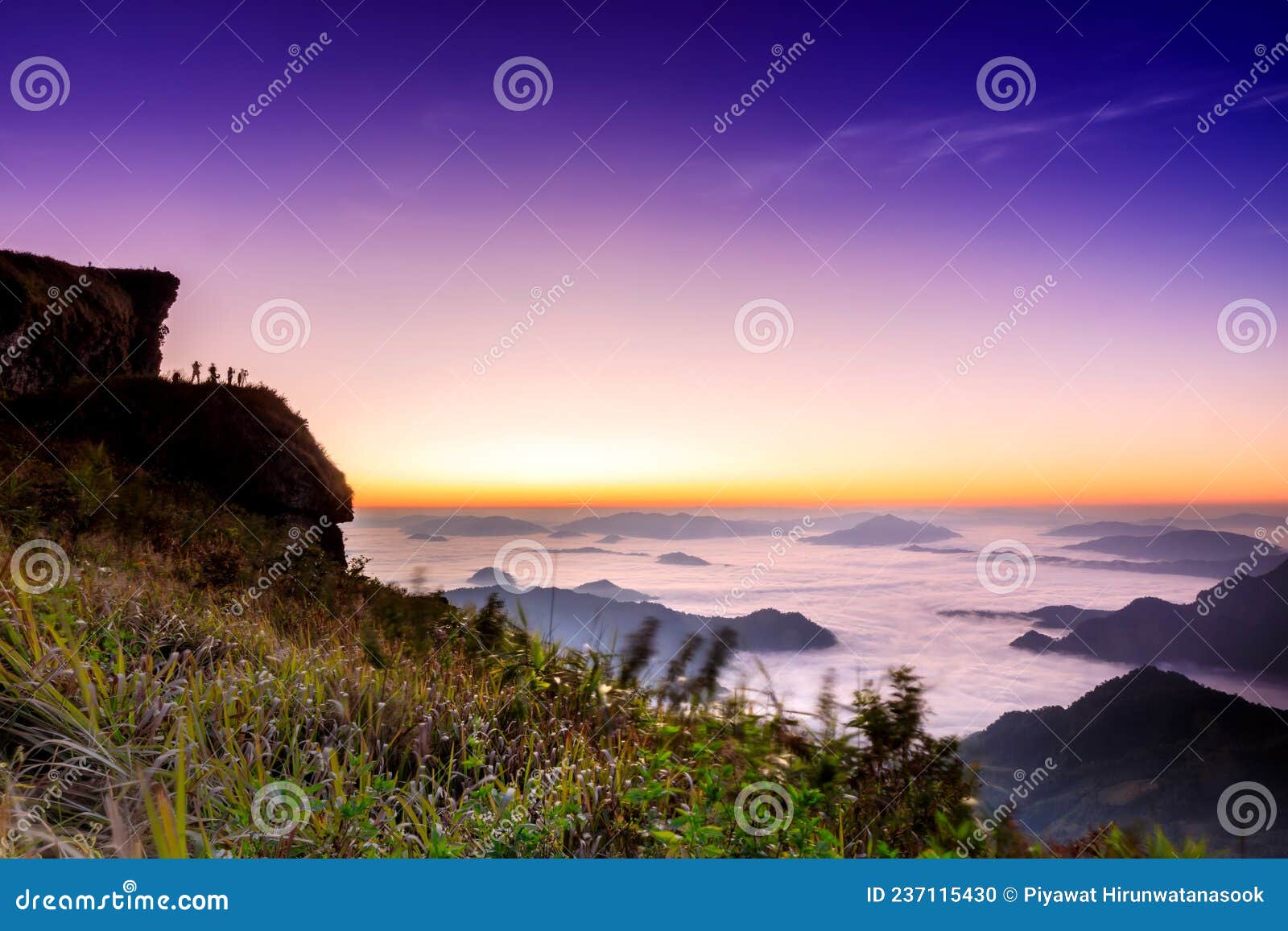 starlight sunrise scene with the peak of mountain called phu chifa with fog over the city below