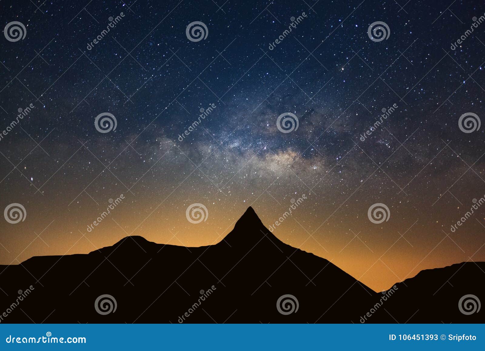 starry night sky with high moutain and milky way galaxy with sta