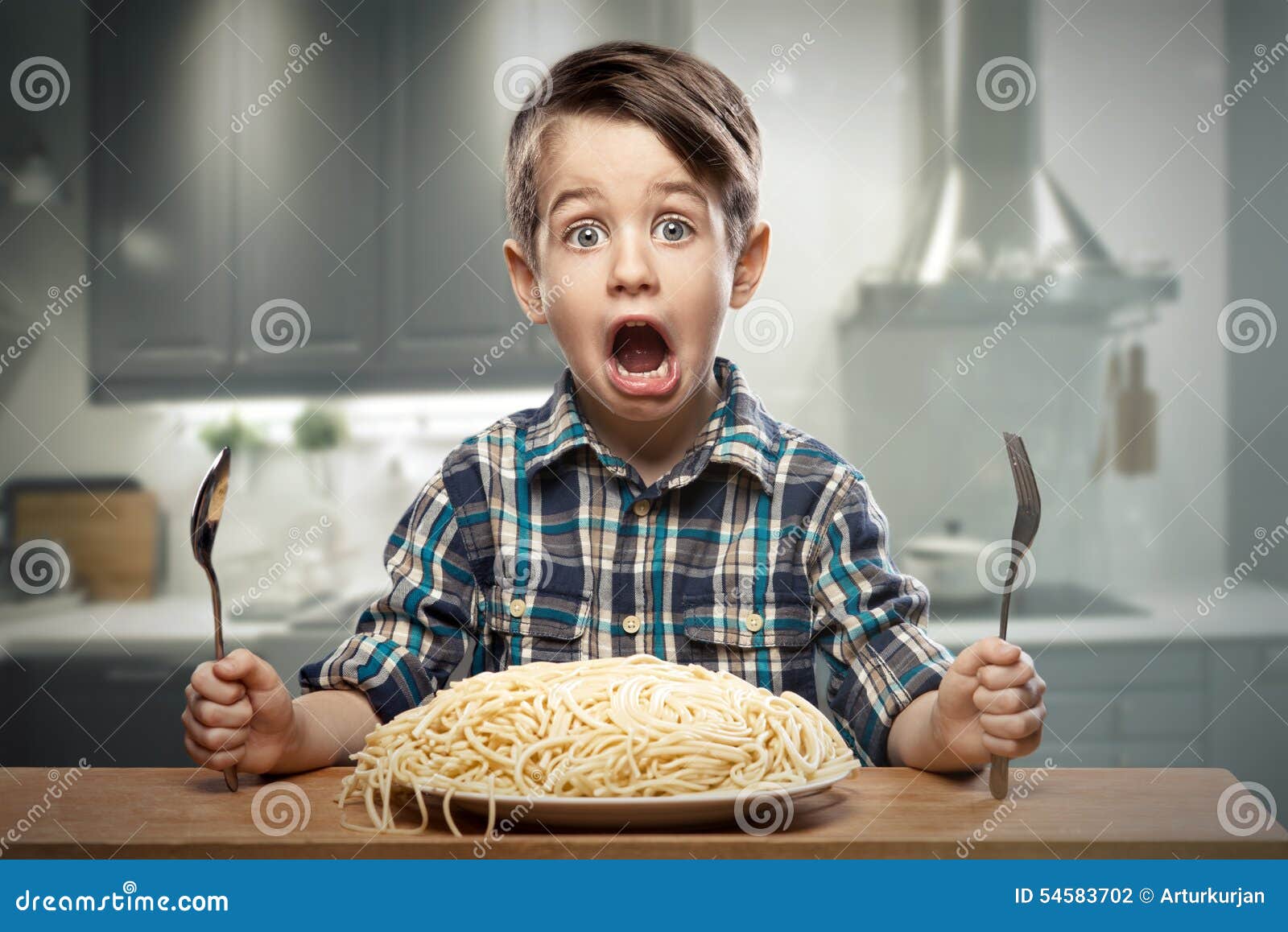 Startled Yound Boy with Noodles Stock Photo Image of cutlery, kitchen