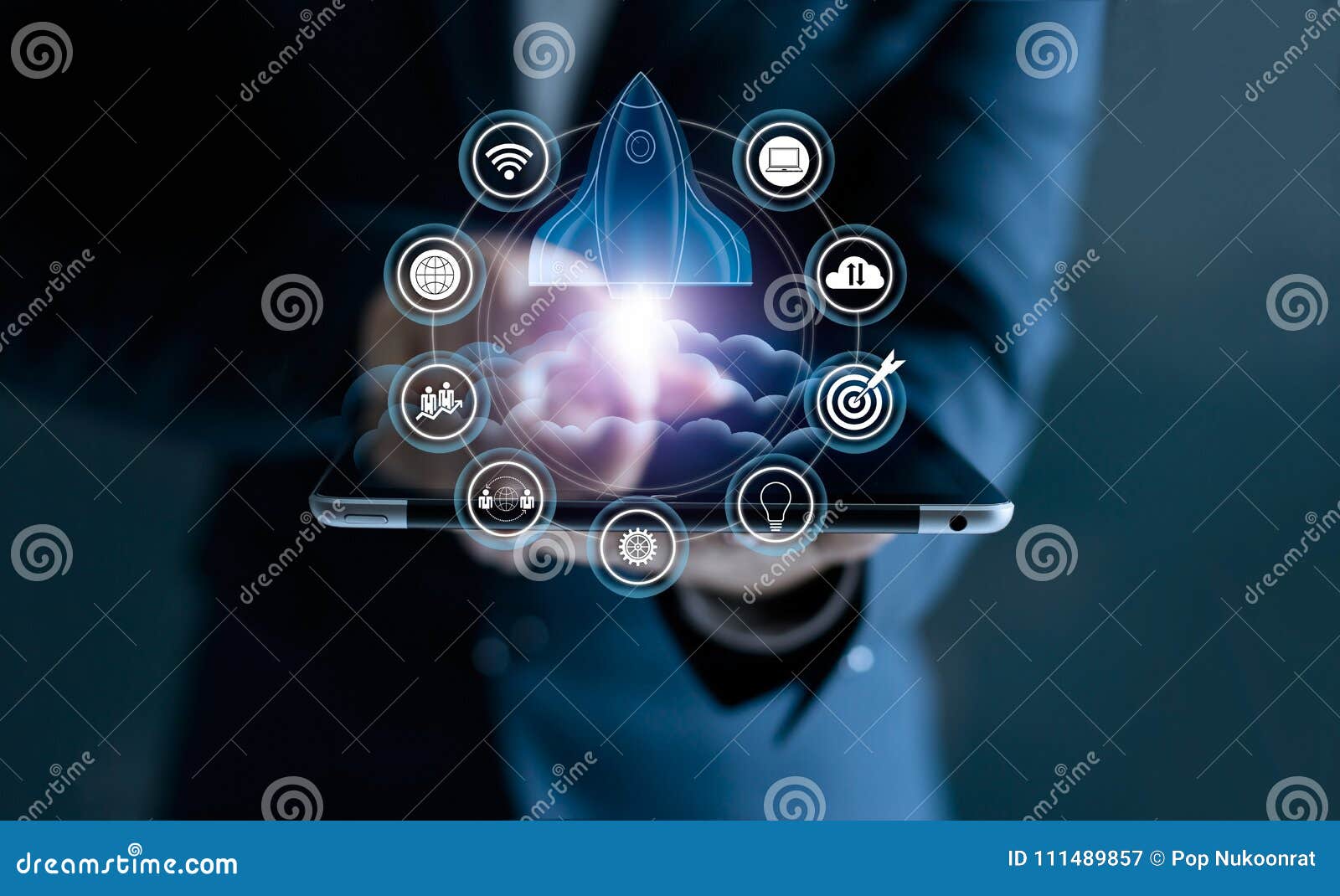 startup concept. businessman touching tablet and icon network