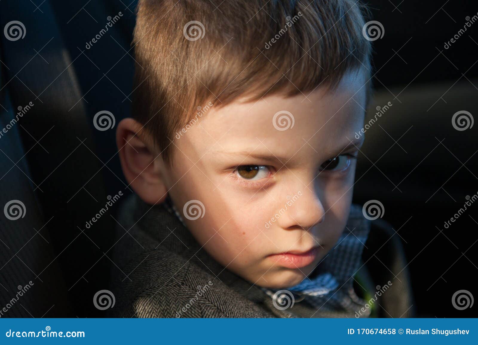 State of Mind Concept of Sad Upset Little Kid Sitting in Car Lit ...