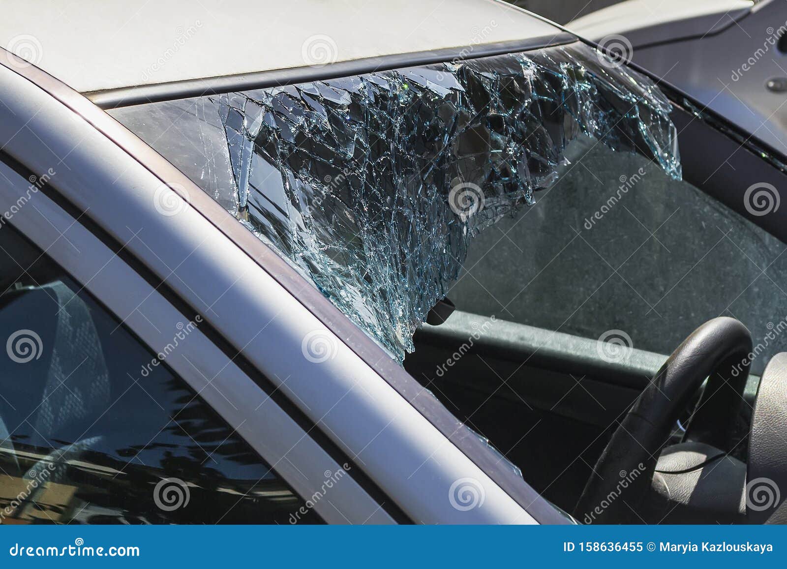 Stationary Car with Broken Windshield. Car Windscreen Smashed by a