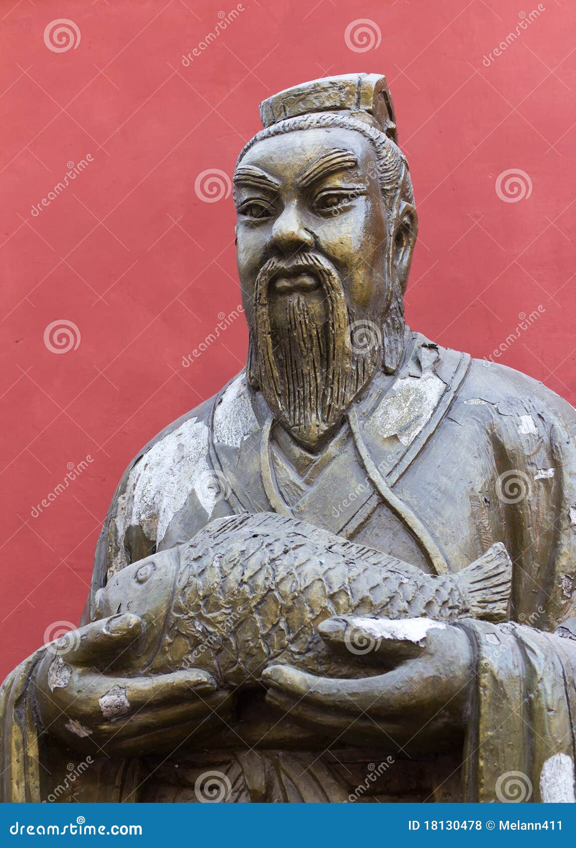 Statue of Chinese Man Holding Fish in Beijing Stock Photo Image of