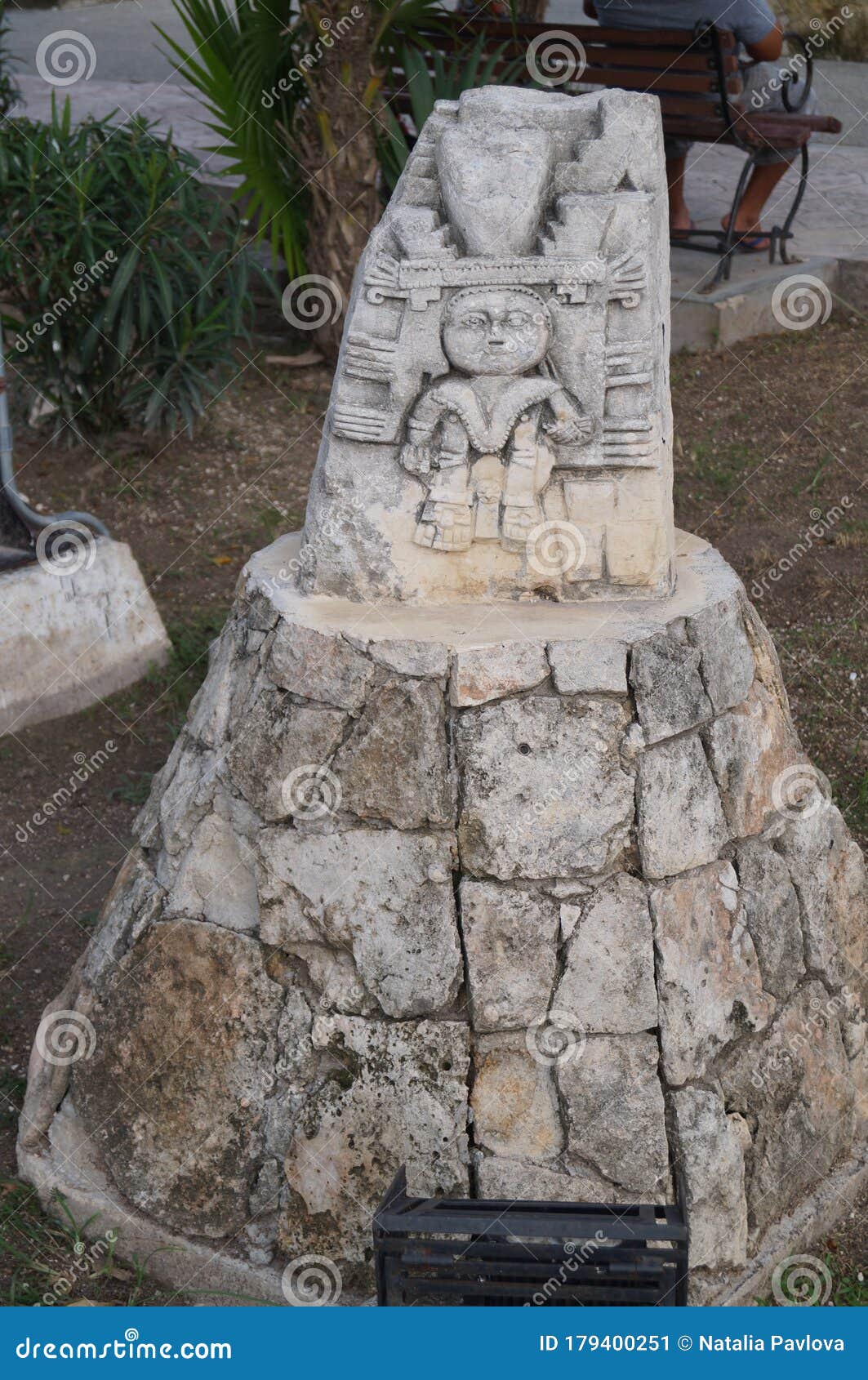 statue in the city of tulum. tulum was one of the last cities built and inhabited by the mayans.  mexico