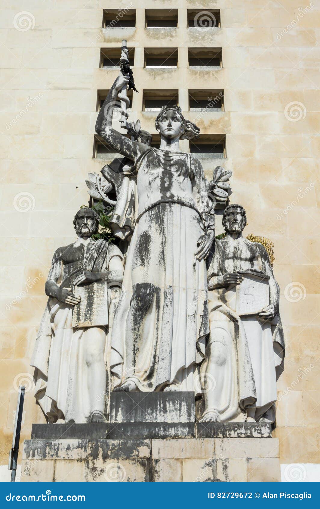 statue in coimbra university