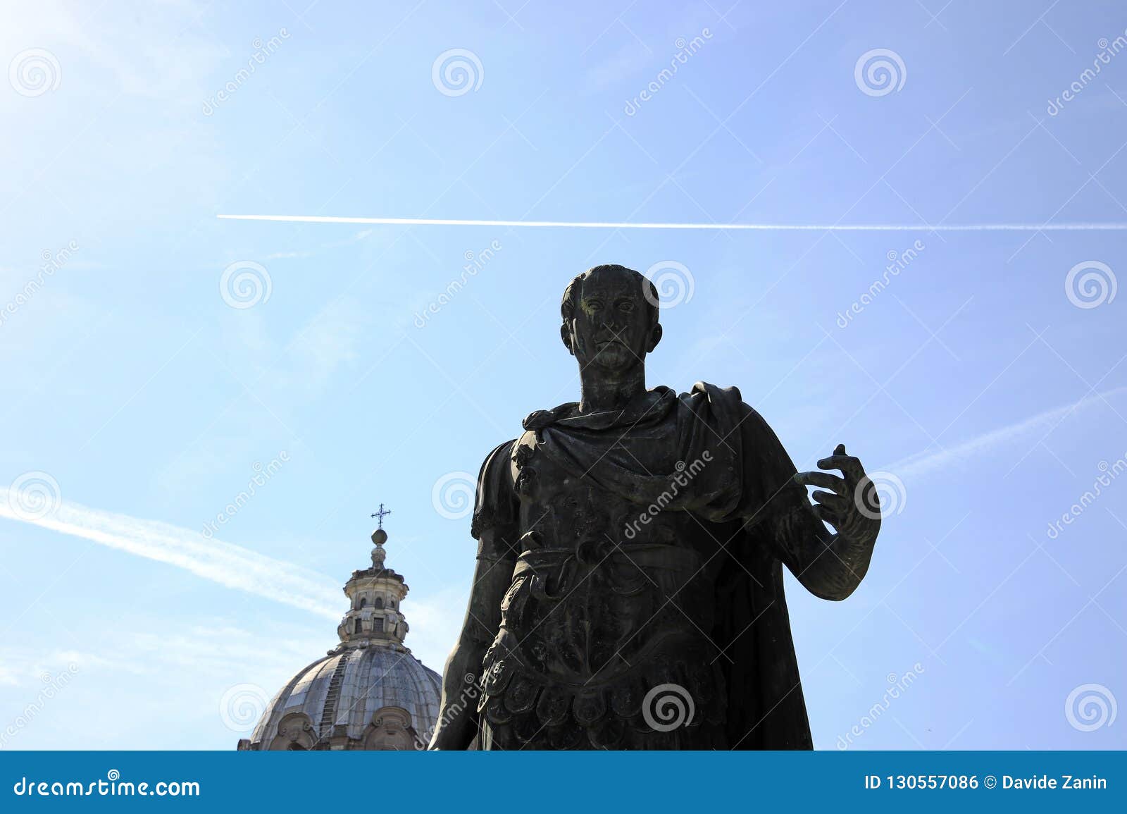 statue of gaius julius caesar at the imperial forums of rome.