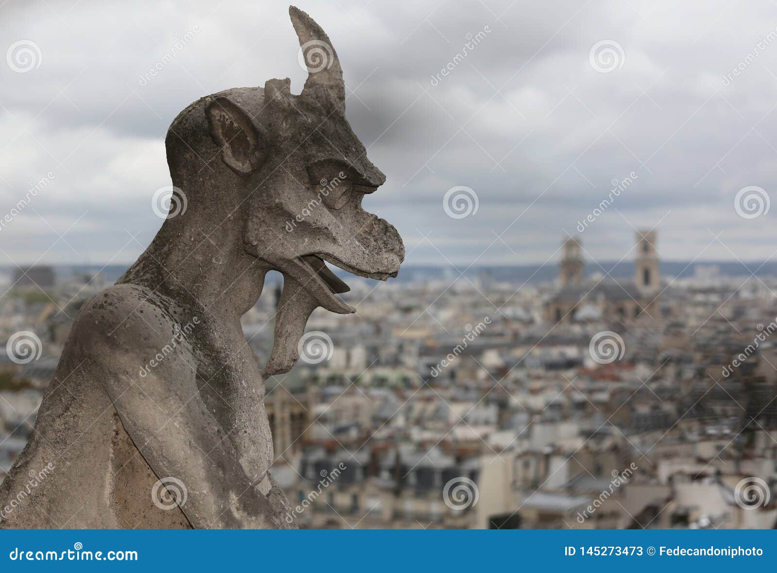 Statue of a Gargoyle the Mythical Winged Monster on the Cathedral Stock