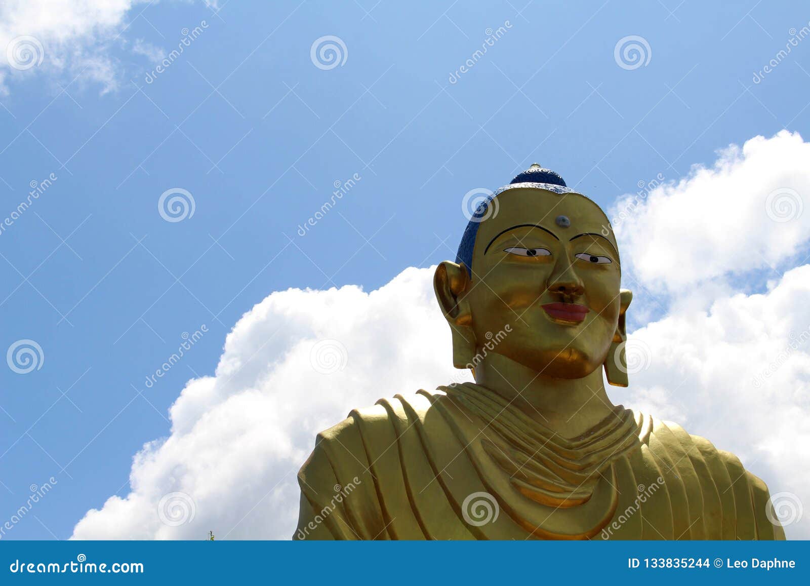 the statue of golden buddha on the way up to dhulikhel hill